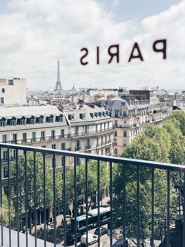 115 rue de provence concrete building with balconies during day 75009 paris